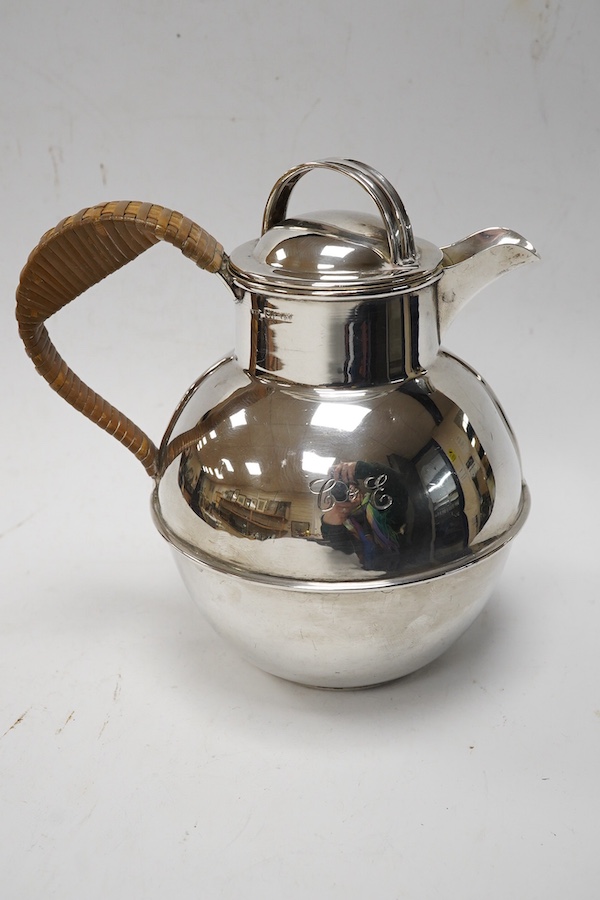 A 1960's silver Guernsey milk can, by Kenneth Tyler Key, height 16cm and two cased sets of spoons (one incomplete) including a pair of berry spoons by Thomas Eustace, Exeter, 1783. Condition - fair to good